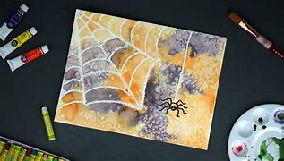 Spider web designs made with wax resist